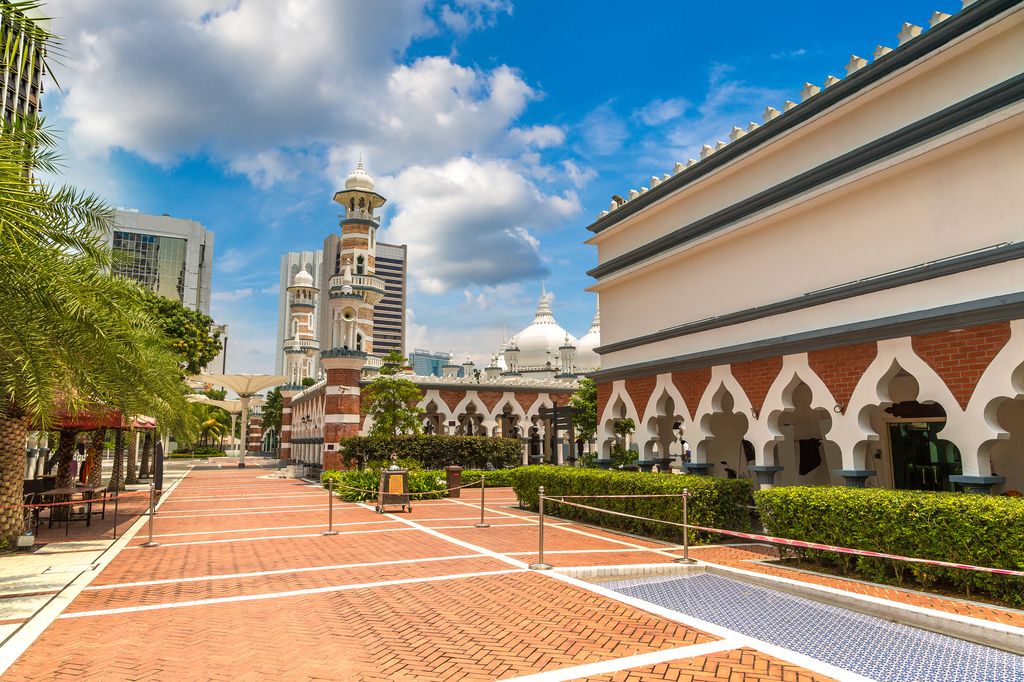 Pathways at and the facade of Sultan Abdul Samad Jamek Mosque in Kuala Lumpur, Malaysia.