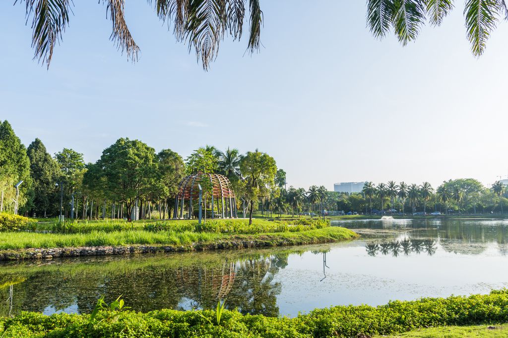 Titiwangsa Lake in Kuala Lumpur, Malaysia surrounded by trees.